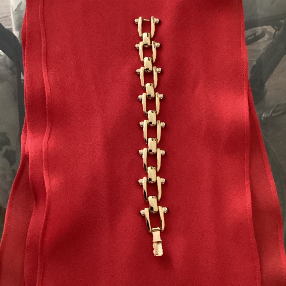 Nolan Miller Glamour Collection gold tone bracelet.